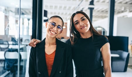 Two colleagues smiling