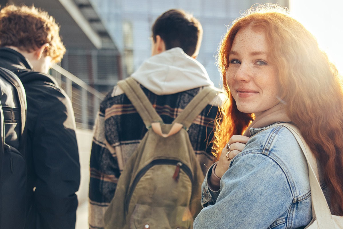 smiling-female-student-looking-at-camera-rectangle