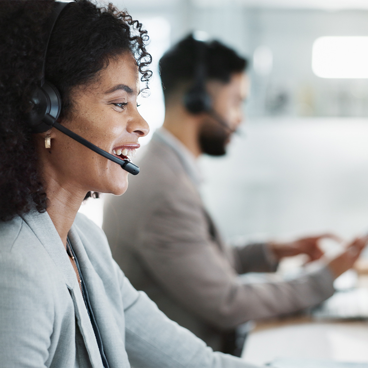 smiling-Premedics-representative-helping-customer-on-phone